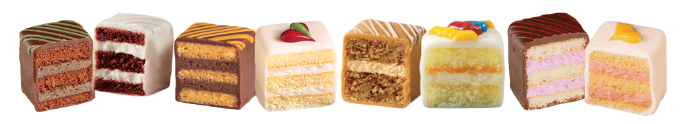 A variety of petits fours in a row cut in half - Buy now, on credit