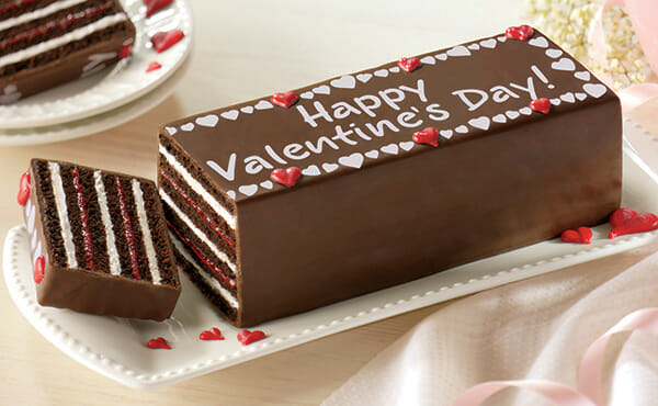Chocolate Torte with red filling - Happy Valentines Day written on top - Buy now, pay later