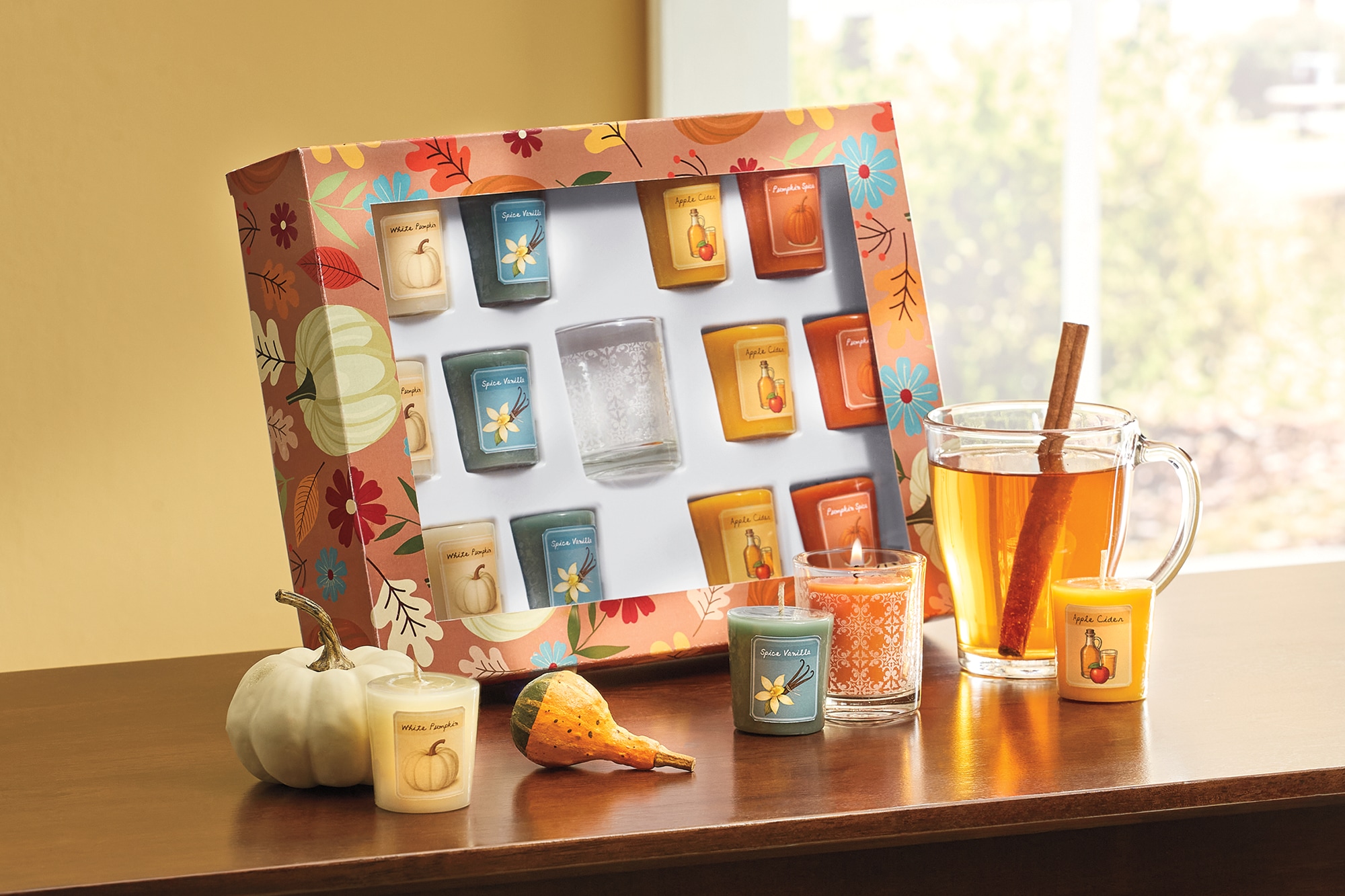 13-Piece Autumn-Scented Pumpkin Votive Candle Set | Swiss Colony