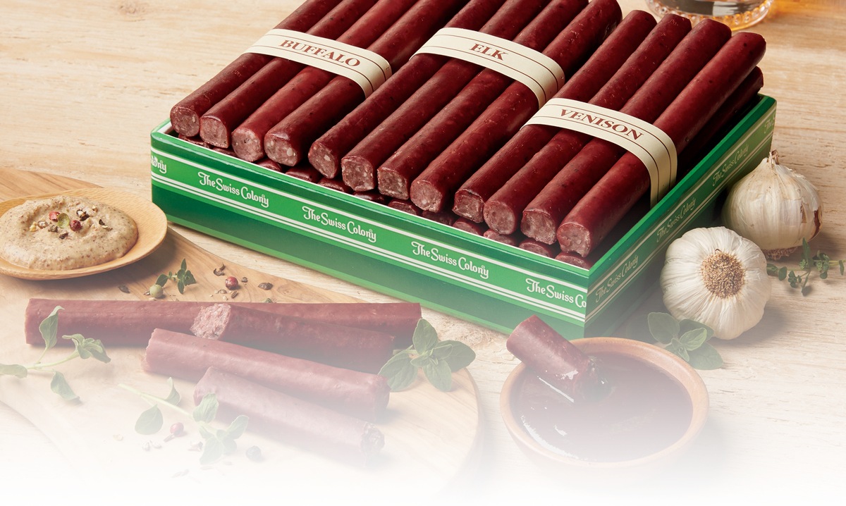 26 Spring Favorites, a gift box containing sweet breads and spreads, Petits Fours, cheeses and sausages, chocolates and candies