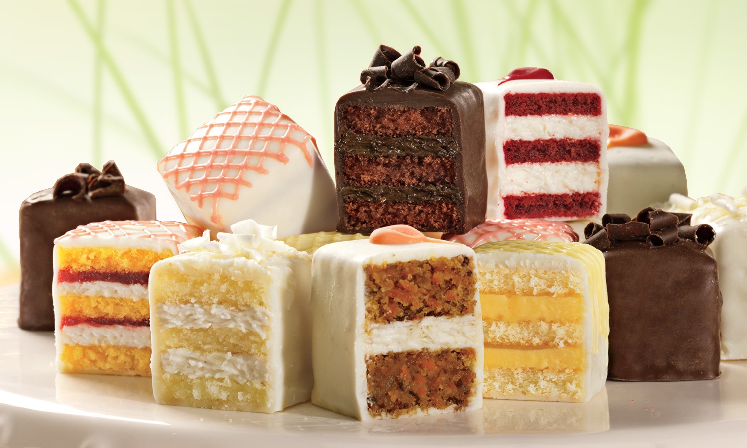A box of hand-decorated Petits Fours in six flavors